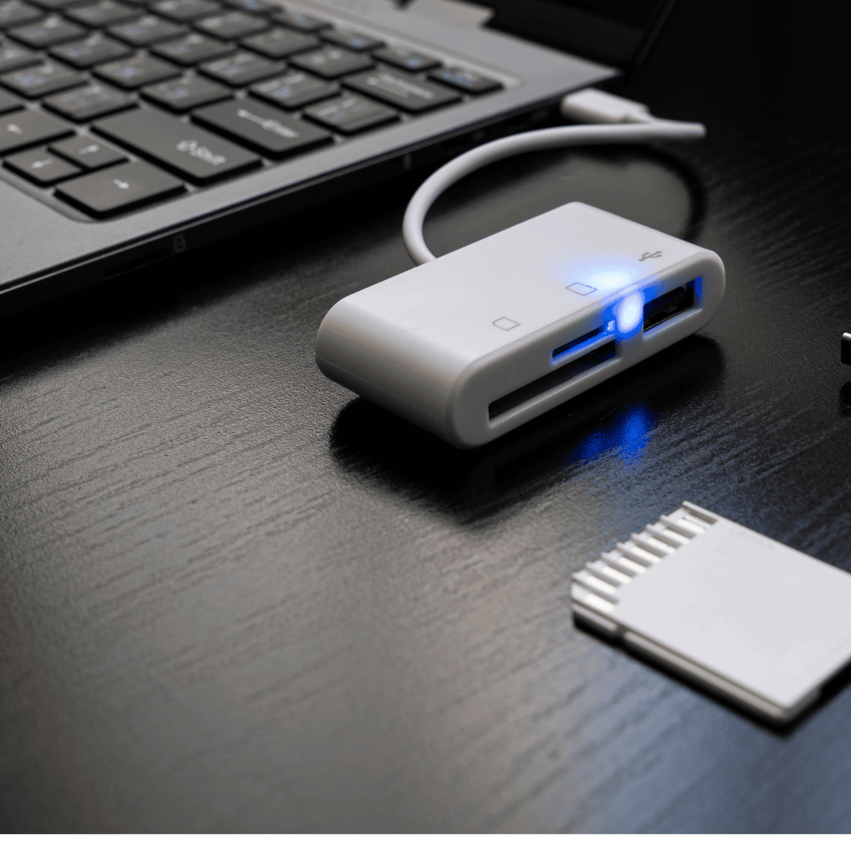 "Portable laptop charger with a sleek power adapter and a sturdy cable, designed for fast and efficient laptop charging."