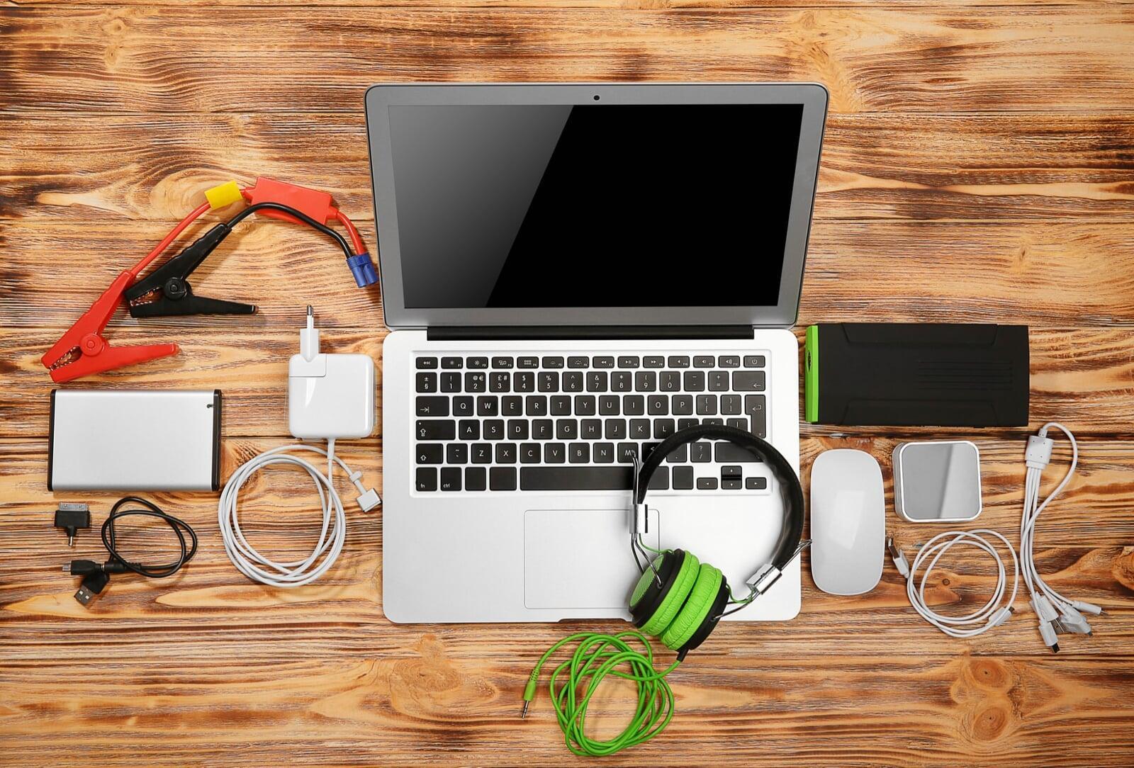"Grid of essential computer accessories like keyboard, mouse, webcam, and USB hub."