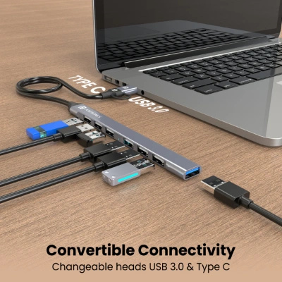 Portronics Mport 7 USB Hub (7-in-1) with dual USB & Type-C heads offers up to 5 Gbps transfer speed. It includes 1 USB 3.0 and 6 USB 2.0 ports, ideal for laptops, MacBooks, and PCs (Grey). Portronics Mport 7 USB Hub (7-in-1) with dual USB & Type-C heads offers up to 5 Gbps transfer speed. It includes 1 USB 3.0 and 6 USB 2.0 ports, ideal for laptops, MacBooks, and PCs (Grey).